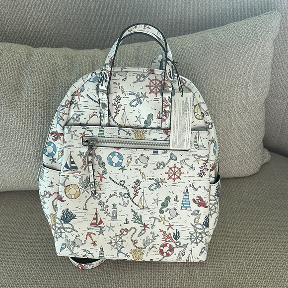White Whimsical Backpack with All-Over Print - Picture 1 of 5